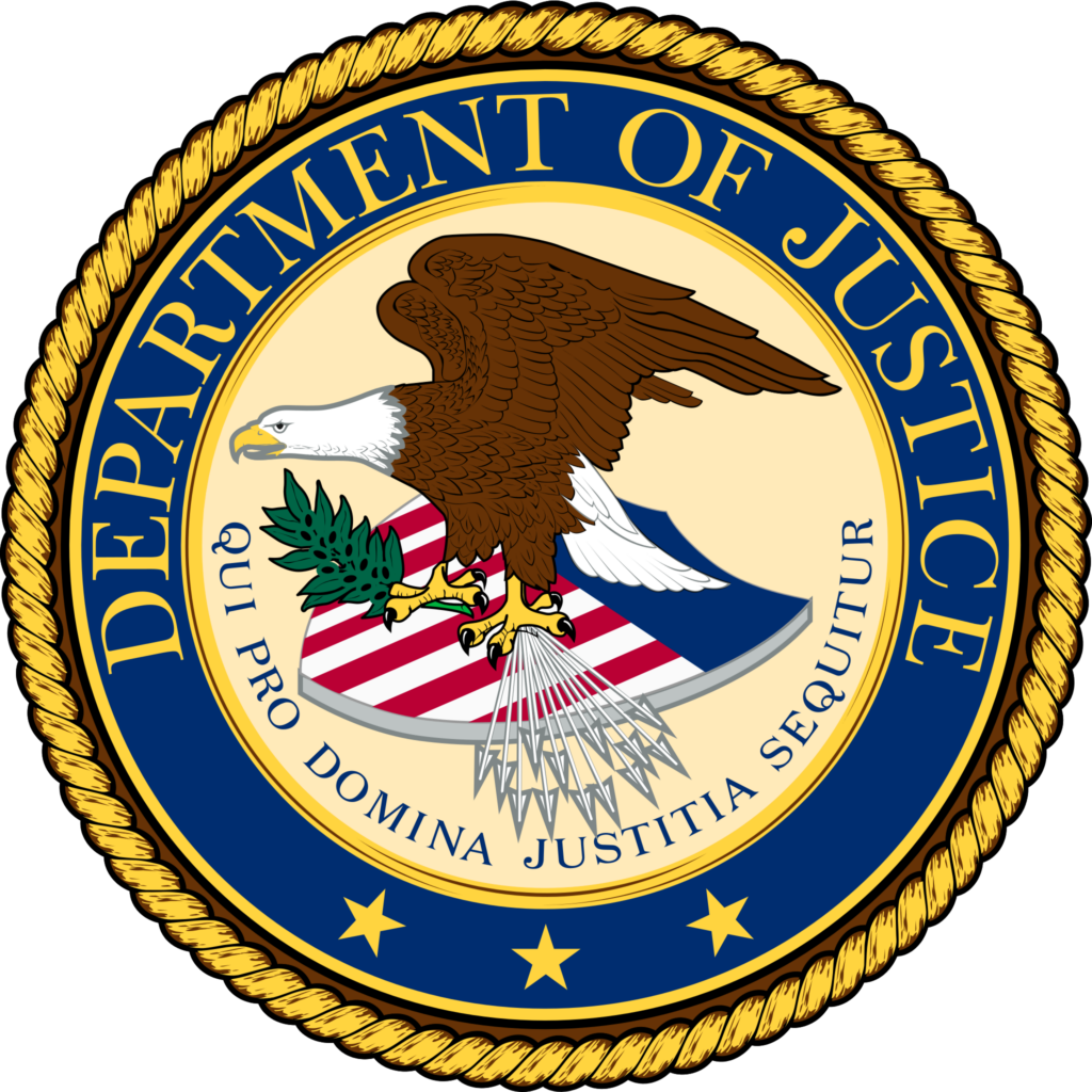 Dept. of Justice logo written in gold letters. A brown and white eagle holds arrows and green leaves with its talons and sits on top an American shield of red white and blue. The words "Qui pro domina justitia sequitur" line the bottom of the logo written in navy blue.